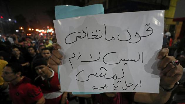 A protester carries a sign that reads “Don't be afraid ..say .. Sisi must leave”. “I think it’s safe to say that the events of the past few weeks, including the development last night (Friday), pose the most serious legitimacy crisis facing Sisi,” Nael Shama, a Cairo-based political analyst, told AFP. “No one shouted bread, freedom, social justice like in 2011, they escalated straight to ‘Leave’ from the first minute,” Shama noted. (Mohamed Abd El Ghany / REUTERS) A protester carries a sign that reads “Don't be afraid ..say .. Sisi must leave”. “I think it’s safe to say that the events of the past few weeks, including the development last night (Friday), pose the most serious legitimacy crisis facing Sisi,” Nael Shama, a Cairo-based political analyst, told AFP. “No one shouted bread, freedom, social justice like in 2011, they escalated straight to ‘Leave’ from the first minute,” Shama noted. (Mohamed Abd El Ghany / REUTERS)