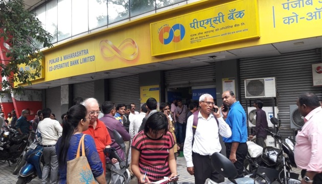 Customers outside a branch of the Punjab and Maharashtra Cooperative (PMC) Bank in Mumbai after the Reserve Bank of India put it under restrictions. (Praful Gangurde/HT PHOTO) Customers outside a branch of the Punjab and Maharashtra Cooperative (PMC) Bank in Mumbai after the Reserve Bank of India put it under restrictions. (Praful Gangurde/HT PHOTO)