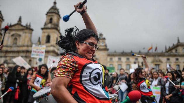 Musicians perform during a climate protest at Bolivar square in Bogota, Colombia, on September 20, 2019 (AFP) Musicians perform during a climate protest at Bolivar square in Bogota, Colombia, on September 20, 2019 (AFP)