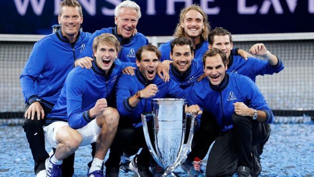 Team Europe captain Bjorn Borg, vice-captain Thomas Enqvist, Alexander Zverev, Dominic Thiem, Fabio Fognini, Stefanos Tsitsipas, Roger Federer and Rafael Nadal pose with the trophy after they win the Laver Cup(REUTERS)