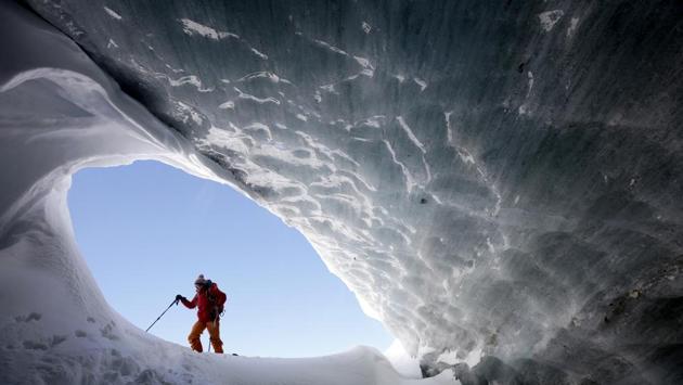Glaciologist Andrea Fischer from the Austrian Institute for Interdisciplinary Mountain Research, walks at the entrance of an ice cave of Jamtalferner glacier. The greater sensitivity makes it all the more urgent to examine the contents of glaciers in the Austrian Alos before they disappear, said Fischer, a scientist conducting the work. (Lisi Neisner / REUTERS) Glaciologist Andrea Fischer from the Austrian Institute for Interdisciplinary Mountain Research, walks at the entrance of an ice cave of Jamtalferner glacier. The greater sensitivity makes it all the more urgent to examine the contents of glaciers in the Austrian Alos before they disappear, said Fischer, a scientist conducting the work. (Lisi Neisner / REUTERS)