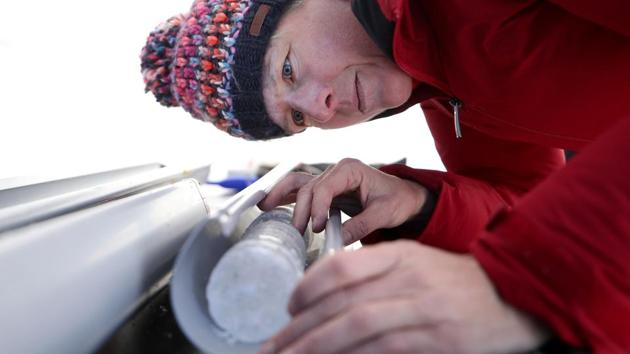 Andrea Fischer examines an ice core of Gepatschferner glacier at Weissseespitze summit, near Feichten im Kaunertal, Austria. “We are now roughly at 1920. The rest has already been lost - everything from 1920 until now," Fischer said of her work seeking Austria's oldest ice at the top of the Weissseespitze, a peak more than 3,500 metres high. (Lisi Neisner / REUTERS) Andrea Fischer examines an ice core of Gepatschferner glacier at Weissseespitze summit, near Feichten im Kaunertal, Austria. “We are now roughly at 1920. The rest has already been lost - everything from 1920 until now," Fischer said of her work seeking Austria's oldest ice at the top of the Weissseespitze, a peak more than 3,500 metres high. (Lisi Neisner / REUTERS)