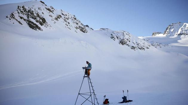 Andrea Fischer checks a precipitation measuring station next to Jamtalferner. The challenge is to take current data on how the climate is changing and compare it with the information we have on the climate in previous centuries and millennia. “The question is, how exceptional is this process? That is what we are determining with this drilling of the ice.” (Lisi Neisner / REUTERS) Andrea Fischer checks a precipitation measuring station next to Jamtalferner. The challenge is to take current data on how the climate is changing and compare it with the information we have on the climate in previous centuries and millennia. “The question is, how exceptional is this process? That is what we are determining with this drilling of the ice.” (Lisi Neisner / REUTERS)