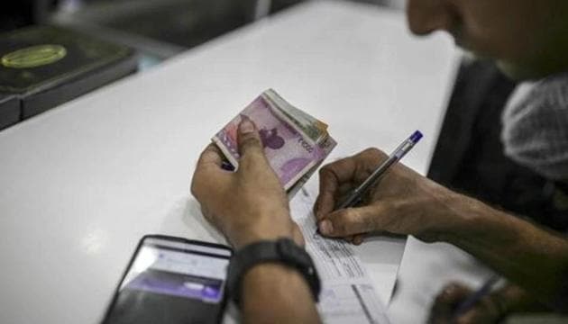 Rupee fell 11 paise to 71.12 against the US dollar on Wednesday. (Bloomberg Photo) Rupee fell 11 paise to 71.12 against the US dollar on Wednesday. (Bloomberg Photo)