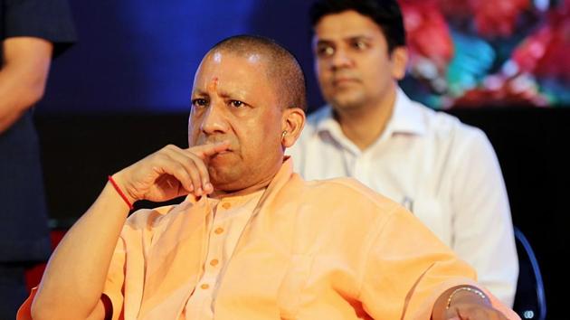 Chief minister Yogi Adityanath on Wednesday gave three mantras of praise, warning and action to senior police officers for improving the law and order situation in the state.(ANI Photo) Chief minister Yogi Adityanath on Wednesday gave three mantras of praise, warning and action to senior police officers for improving the law and order situation in the state.(ANI Photo)