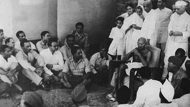 Gandhi flanked by Vallabhbhai Patel and Jawaharlal Nehru (standing behind him) with officers of the Indian National Army in Delhi, April 1946. Incidentally, the Second INA revived under Subhash Chandra Bose in 1943, consisted of the two battalion strong Gandhi Brigade also known as the 2nd Guerrilla Regiment. (HT Archive) Gandhi flanked by Vallabhbhai Patel and Jawaharlal Nehru (standing behind him) with officers of the Indian National Army in Delhi, April 1946. Incidentally, the Second INA revived under Subhash Chandra Bose in 1943, consisted of the two battalion strong Gandhi Brigade also known as the 2nd Guerrilla Regiment. (HT Archive)
