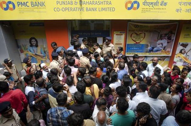 PMC bank account gathered outside the bank at Bhandup after RBI imposed restrictions on PMC Bank; withdrawal restricted to Rs 1,000 per account in Mumbai on September 24, 2019.(Satish Bate/HT Photo) PMC bank account gathered outside the bank at Bhandup after RBI imposed restrictions on PMC Bank; withdrawal restricted to Rs 1,000 per account in Mumbai on September 24, 2019.(Satish Bate/HT Photo)