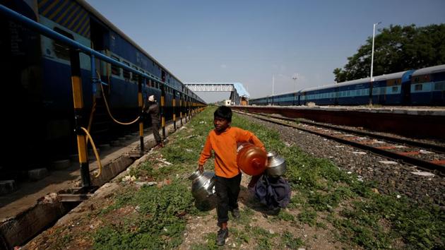 Siddharth Dhage carries empty water containers along railway tracks at Aurangabad railway station. The children take the train daily to fetch water from the nearby city of Aurangabad. The train is often overcrowded, so a group of small children jostling to get on board with pitchers to fill with water is not always welcome. (Francis Mascarenhas / REUTERS) Siddharth Dhage carries empty water containers along railway tracks at Aurangabad railway station. The children take the train daily to fetch water from the nearby city of Aurangabad. The train is often overcrowded, so a group of small children jostling to get on board with pitchers to fill with water is not always welcome. (Francis Mascarenhas / REUTERS)