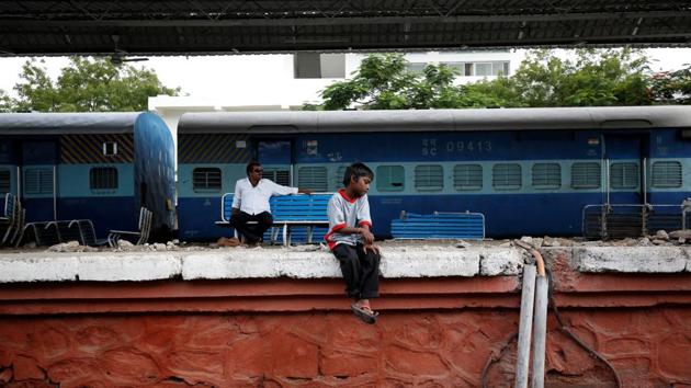 Siddharth Dhage waits for the train to arrive after filling his containers with water at Aurangabad railway station during one of his runs. “I don’t like to spend time bringing water, but I don’t have a choice,” Dhage said of his compulsion. (Francis Mascarenhas / REUTERS) Siddharth Dhage waits for the train to arrive after filling his containers with water at Aurangabad railway station during one of his runs. “I don’t like to spend time bringing water, but I don’t have a choice,” Dhage said of his compulsion. (Francis Mascarenhas / REUTERS)