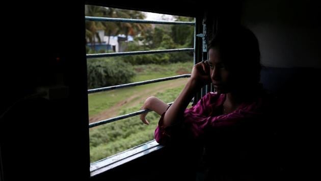 Manju Gaikwad, 11, looks out of the window of a train on her way back home to Mukundwadi railway station. When the train returns them to Mukundwadi, they have just under a minute to disembark. At times, Dhage’s mother, Jyoti, is waiting at the station to help. (Francis Mascarenhas / REUTERS) Manju Gaikwad, 11, looks out of the window of a train on her way back home to Mukundwadi railway station. When the train returns them to Mukundwadi, they have just under a minute to disembark. At times, Dhage’s mother, Jyoti, is waiting at the station to help. (Francis Mascarenhas / REUTERS)