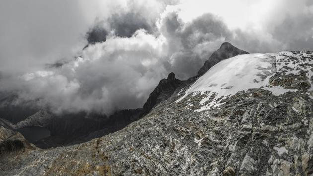 An aerial view of the Humboldt glacier, in Merida, Venezuela. Temperatures are warming faster at the Earth’s higher elevations than in lowlands, and scientists predict that the glacier — an ice sheet in the Andes Mountains — could be gone within two decades. “If we left and came back in 20 years, we would have missed it,” said Luis Daniel Llambi, a mountain ecologist at the University of the Andes. (Jose Manuel Romero / AP) An aerial view of the Humboldt glacier, in Merida, Venezuela. Temperatures are warming faster at the Earth’s higher elevations than in lowlands, and scientists predict that the glacier — an ice sheet in the Andes Mountains — could be gone within two decades. “If we left and came back in 20 years, we would have missed it,” said Luis Daniel Llambi, a mountain ecologist at the University of the Andes. (Jose Manuel Romero / AP)