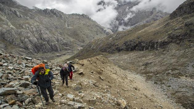 “Practically all of the high-mountain tropical glaciers are in the Andes. There’s still a little bit on Mount Kilimanjaro,” said Robert Hofstede, a tropical ecologist in Ecuador. Monitoring Humboldt depends on continuous visits, Llambi noted. Even in the best of circumstances, it’s no easy trek from the town of Merida to the ice sheet in Venezuela’s Sierra Nevada National Park at nearly 16,500 feet above sea level. (Jose Manuel Romero / AP) “Practically all of the high-mountain tropical glaciers are in the Andes. There’s still a little bit on Mount Kilimanjaro,” said Robert Hofstede, a tropical ecologist in Ecuador. Monitoring Humboldt depends on continuous visits, Llambi noted. Even in the best of circumstances, it’s no easy trek from the town of Merida to the ice sheet in Venezuela’s Sierra Nevada National Park at nearly 16,500 feet above sea level. (Jose Manuel Romero / AP)