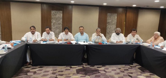The meeting of the state election committee was held here with Venugopal and other seniors present, and the Congress state leaders were an upbeat lot as they believed they had a chance to exact revenge against the 17 rebels, whose disqualifications had necessitated bypolls. (Photo @INCKarnataka) The meeting of the state election committee was held here with Venugopal and other seniors present, and the Congress state leaders were an upbeat lot as they believed they had a chance to exact revenge against the 17 rebels, whose disqualifications had necessitated bypolls. (Photo @INCKarnataka)