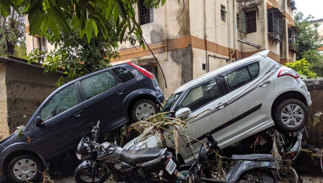 Heavy rains in Pune on Wednesday night caused widespread damage. Seen here are cars piled up in Gururaj Housing Society, in the city’s Padmawati area.(Sanket Wankhade / HT Photo) Heavy rains in Pune on Wednesday night caused widespread damage. Seen here are cars piled up in Gururaj Housing Society, in the city’s Padmawati area.(Sanket Wankhade / HT Photo)