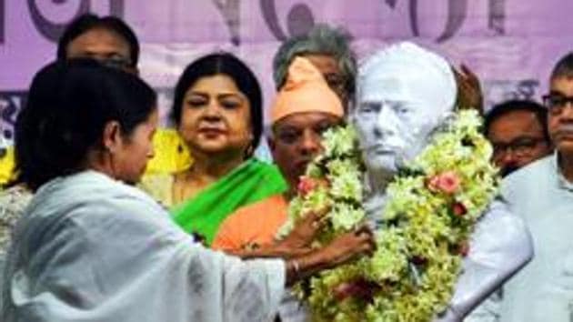 West Bengal Chief Minister Mamata Banerjee garlands the statue of Ishwar Chandra Vidyasagar at Hare school ground in Kolkata on July 11(ANI)