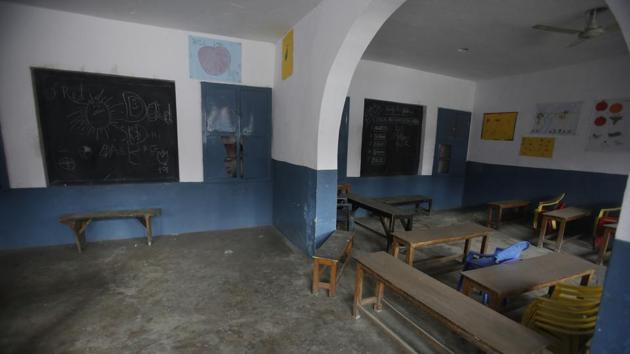 A classroom stands empty at a school in Srinagar. The authorities have encouraged students to return to school but parents have largely been unwilling to send their children back because of the restrictions that remain in place. (Mukhtar Khan / AP) A classroom stands empty at a school in Srinagar. The authorities have encouraged students to return to school but parents have largely been unwilling to send their children back because of the restrictions that remain in place. (Mukhtar Khan / AP)