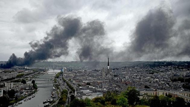Smoke billows from a Seveso classified Lubrizol factory on fire in Rouen, northwestern France. Residents of twelve towns including Rouen have been asked to stay at home after a fire broke out at a Lubrizol factory classified Seveso high-threshold site, according to the prefect of Normandy. (Philippe Lopez / AFP) Smoke billows from a Seveso classified Lubrizol factory on fire in Rouen, northwestern France. Residents of twelve towns including Rouen have been asked to stay at home after a fire broke out at a Lubrizol factory classified Seveso high-threshold site, according to the prefect of Normandy. (Philippe Lopez / AFP)