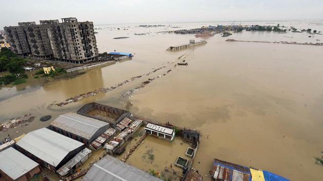 Besides enduring the ravages of nature, residents of flood-hit areas will also have to deal with alligators and crocodiles, being spotted frequently in the rural areas (ANI Photo) Besides enduring the ravages of nature, residents of flood-hit areas will also have to deal with alligators and crocodiles, being spotted frequently in the rural areas (ANI Photo)