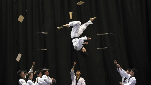 Members of the South Korean Taekwondo demonstration team perform during a visit by Bulgarian Prime Minister Boyko Borisov at Kukkiwon, the headquarters and academy of World Taekwondo, in Seoul, South Korea. (Ahn Young-joon / AP) Members of the South Korean Taekwondo demonstration team perform during a visit by Bulgarian Prime Minister Boyko Borisov at Kukkiwon, the headquarters and academy of World Taekwondo, in Seoul, South Korea. (Ahn Young-joon / AP)