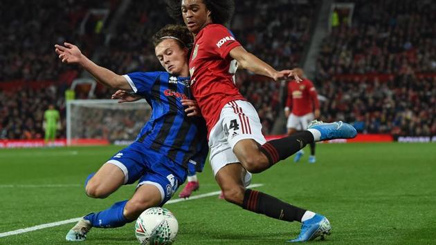 Rochdale's English defender Luke Matheson (L) vies with Manchester United's Dutch midfielder Tahith Chong (R) during the English League Cup third round football match between Manchester United and Rochdale at Old Trafford in Manchester, north-west England. (Paul Ellis / AFP) Rochdale's English defender Luke Matheson (L) vies with Manchester United's Dutch midfielder Tahith Chong (R) during the English League Cup third round football match between Manchester United and Rochdale at Old Trafford in Manchester, north-west England. (Paul Ellis / AFP)