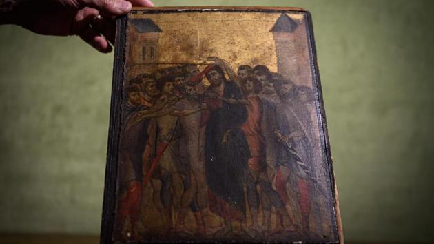 A painting entitled "The Mocking of Christ" by the late 13th century Florentine artist Cenni di Pepo also known as Cimabue, at Paris, France. (Philippe Lopez / AFP) A painting entitled "The Mocking of Christ" by the late 13th century Florentine artist Cenni di Pepo also known as Cimabue, at Paris, France. (Philippe Lopez / AFP)