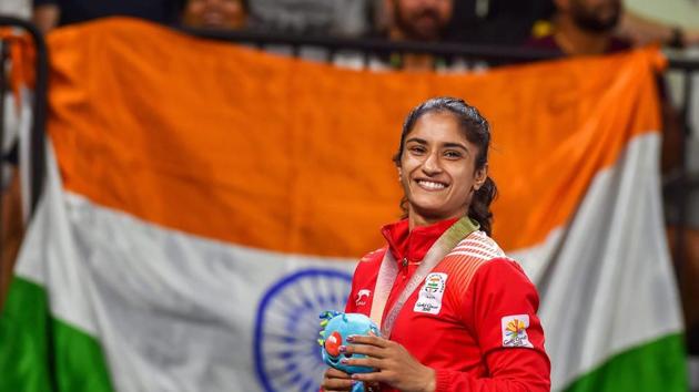 Vinesh Phogat poses for pictures at the Commonwealth Games 2018 in Gold Coast, Australia.(PTI Photo)