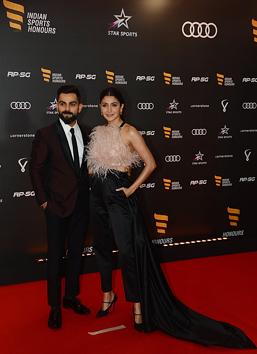 Indian cricket skipper Virat Kohli along with his wife and Bollywood actor Anushka Sharma during the second edition of Indian Sports Honours in Mumbai. (ani)