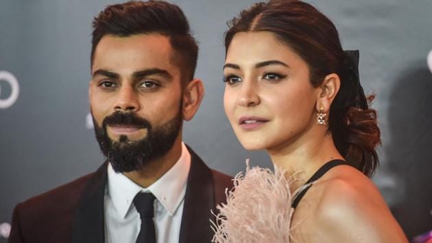 Indian cricketer Virat Kohli and wife Anushka Sharma arrive for the Indian Sports Honours awards in Mumbai. (PTI)