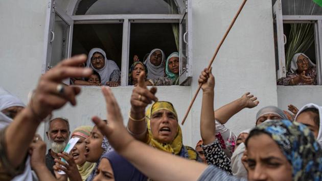 Women shout slogans in Anchar neighbourhood after Friday prayers during restrictions. Authorities have arrested nearly 4,000 people since the decision provoked outrage in the region and inflamed tensions with Pakistan, which also claims the territory. (Danish Siddiqui / REUTERS)