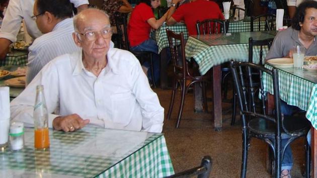 Boman Rashid Kohinoor sitting at his café — Britania and Co at Ballard Estate, Mumbai