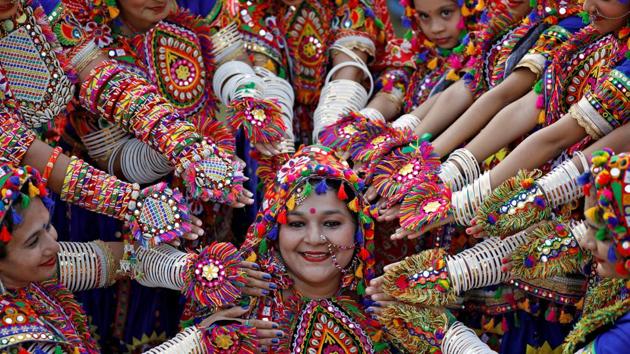 Participants dressed in traditional attire pose for pictures during rehearsals for Garba, a folk dance, in preparations for the upcoming Navratri, a festival during which devotees worship the Hindu goddess Durga, in Ahmedabad, Gujarat. (Amit Dave / REUTERS) Participants dressed in traditional attire pose for pictures during rehearsals for Garba, a folk dance, in preparations for the upcoming Navratri, a festival during which devotees worship the Hindu goddess Durga, in Ahmedabad, Gujarat. (Amit Dave / REUTERS)