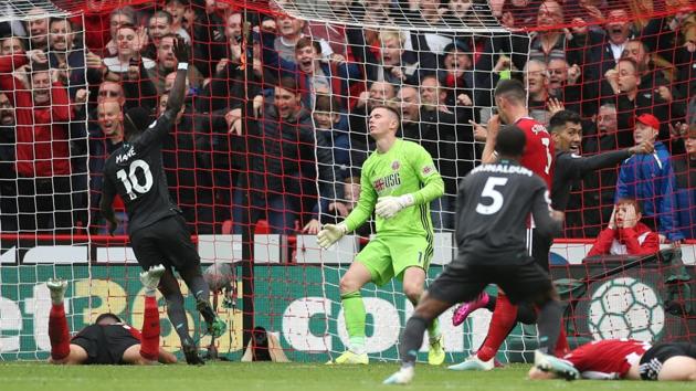Liverpool players celebrate 1-0 win over Brighton. (Reuters) Liverpool players celebrate 1-0 win over Brighton. (Reuters)