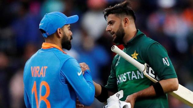 India captain Virat Kohli shakes hands with Pakistan’s Imad Wasim.(File/Reuters)