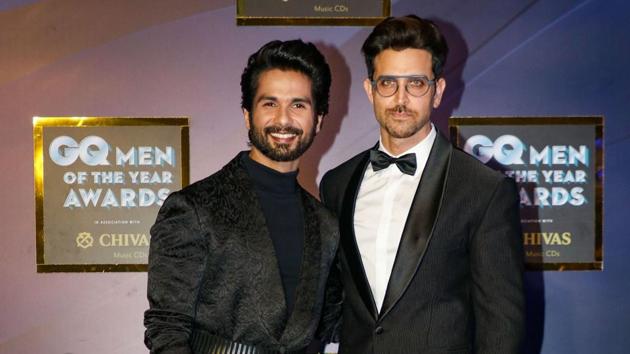 Bollywood actors Hrithik Roshan and Shahid Kapoor pose for photos. (PTI)