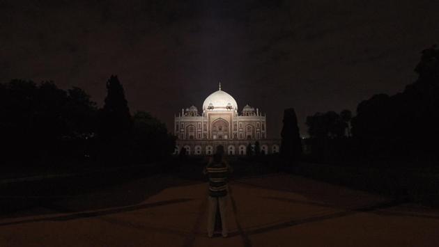 A person takes photos at Humayun’s Tomb. There is still much enthusiasm for the move. “People are looking forward to the ambience created by the illuminated monuments and it’s a treat for those wanting to click photographs,” Abu Sufiyan, who conducts heritage walks in Old Delhi said. Viswanath added that it’s a great idea to encourage night tourism, particularly in the summers. “Why should we get stuck at our homes after 7pm,” she asked. (Amal KS / HT Photo) A person takes photos at Humayun’s Tomb. There is still much enthusiasm for the move. “People are looking forward to the ambience created by the illuminated monuments and it’s a treat for those wanting to click photographs,” Abu Sufiyan, who conducts heritage walks in Old Delhi said. Viswanath added that it’s a great idea to encourage night tourism, particularly in the summers. “Why should we get stuck at our homes after 7pm,” she asked. (Amal KS / HT Photo)