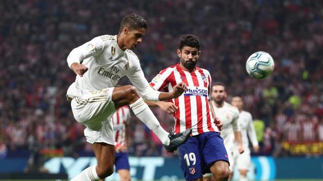 Atletico Madrid v Real Madrid - Wanda Metropolitano, Madrid, Spain - September 28, 2019 Real Madrid's Raphael Varane in action with Atletico Madrid's Diego Costa REUTERS/Sergio Perez(REUTERS)