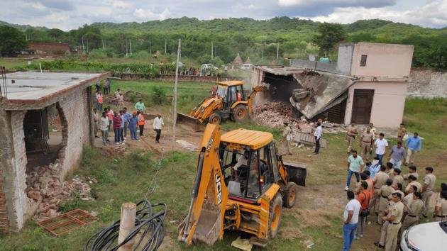A demolition drive in progress at Khuda Alisher in Chandigarh on Monday.(Sanjeev Sharma/HT) A demolition drive in progress at Khuda Alisher in Chandigarh on Monday.(Sanjeev Sharma/HT)