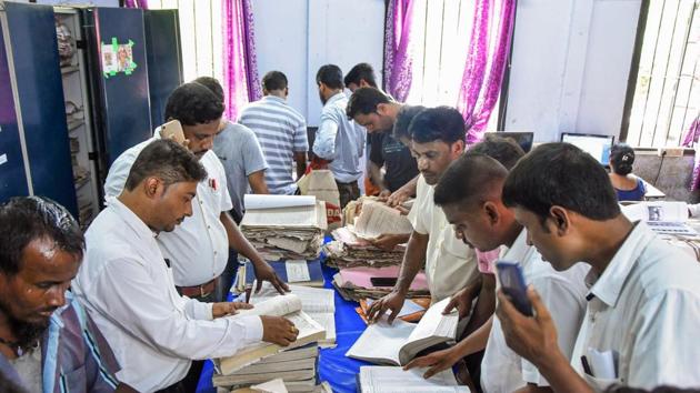 Applicants submit their appeals after the release of final NRC list at an election office, in Tezpur.(PTI)