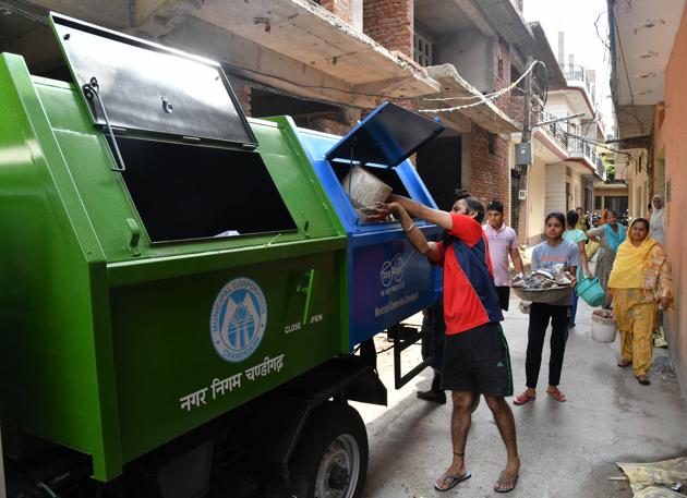 The new garbage collection vehicles at Sarangpur village in Chandigarh.(Karun Sharma/HT)