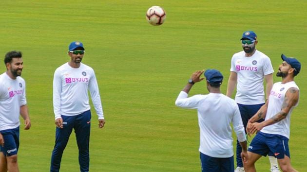 Indian skipper Virat Kohli (R) plays football with teammates during a practice session.(PTI) Indian skipper Virat Kohli (R) plays football with teammates during a practice session.(PTI)