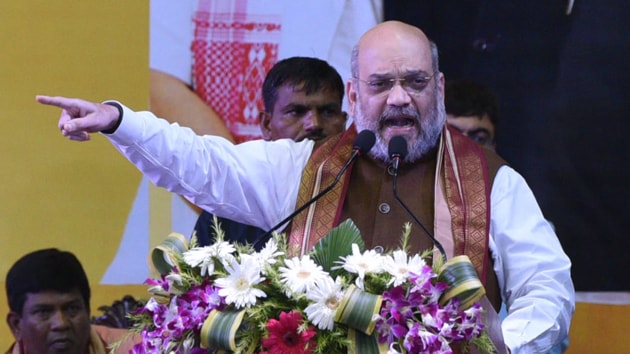 BJP president and Union Home minister Amit Shah at Netaji Indoor stadium during a Party programme on NRC in Kolkata on Tuesday.(Samir Jana/ HT Photo) BJP president and Union Home minister Amit Shah at Netaji Indoor stadium during a Party programme on NRC in Kolkata on Tuesday.(Samir Jana/ HT Photo)