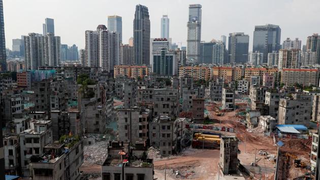 The area of Xiancun, which is in the process of redevelopment, is seen from a new apartment block in Guangzhou. It is one of the ‘urban villages’ that represent the disparities of modern China. While Xiancun’s cramped streets once offered affordable homes for migrants drawn to Guangzhou’s prosperity and opportunities, it is now being swept away by redevelopment. (Jorge Silva / REUTERS)
