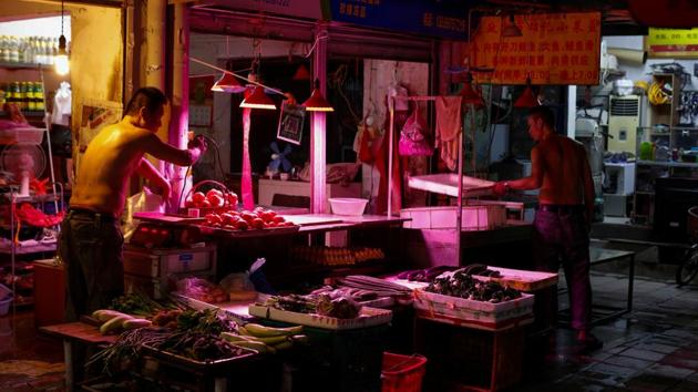 Men work in a market in Yuexiu, Guanghzou, China. One of the country’s most important manufacturing hubs, Guangzhou sprawls over 56,000 sq km with a population of more than 70 million. However, it has managed to retain its traditional values as it undergoes economic change. The city has a combined gross domestic product of about $1.5 trillion, roughly equivalent to that of Australia or South Korea. (Jorge Silva / REUTERS)