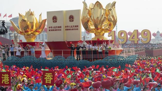 A float for Hong Kong takes part in a parade for the 70th anniversary of the founding of the People's Republic of China in Beijing. A colourful parade with 70 floats and 1,00,000 participants highlighting communist China's achievements followed a military parade in Beijing on the occasion. (Ng Han Guan / AP)