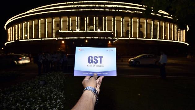 The Goods and Services Tax (GST) collections dropped sharply to a 19-month low of Rs 91,916 crore in September, mirroring a widening slowdown in economy triggered by shrinking consumer demand.(HT FILE PHOTO.)