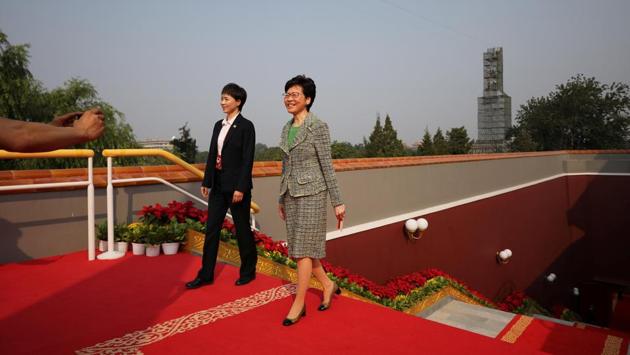 Hong Kong Chief Executive Carrie Lam arrives before the military parade in Beijing. Lam attended Tuesday's parade in Beijing, accompanied by dozens of Hong Kong officials and dignitaries in a show of unity with the ruling party. (Sheng Jiapeng / REUTERS)