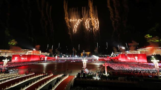 The number "70" formed by fireworks is seen in the sky over Tiananmen Square during an evening gala in Beijing. After Mao’s death in 1976, the party launched the reform and opening-up policy under paramount leader Deng Xiaoping, starting decades of breakneck growth and development. But the party retained a stranglehold on power, sending troops to end the biggest challenge to its rule in 1989 when pro-democracy protesters occupied Tiananmen Square. (REUTERS)