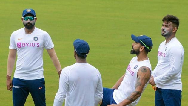 Indian skipper Virat Kohli plays football with teammates during a practice session. (PTI) Indian skipper Virat Kohli plays football with teammates during a practice session. (PTI)