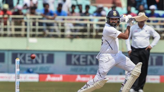 Indian opener Rohit Sharma plays a shot on the first day of the 1st Test match between India and South Africa at Dr YS Rajasekhara Reddy ACA-VDCA Cricket Stadium, in Visakhapatnam.(PTI)