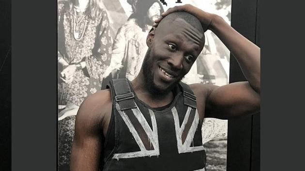Scores of people vied for a view of some of the guerilla graffiti artist’s works, including the stab vest he designed for grime artist Stormzy (pictured) to wear during his headline performance at this year’s Glastonbury Festival. (Instagram/banksy)